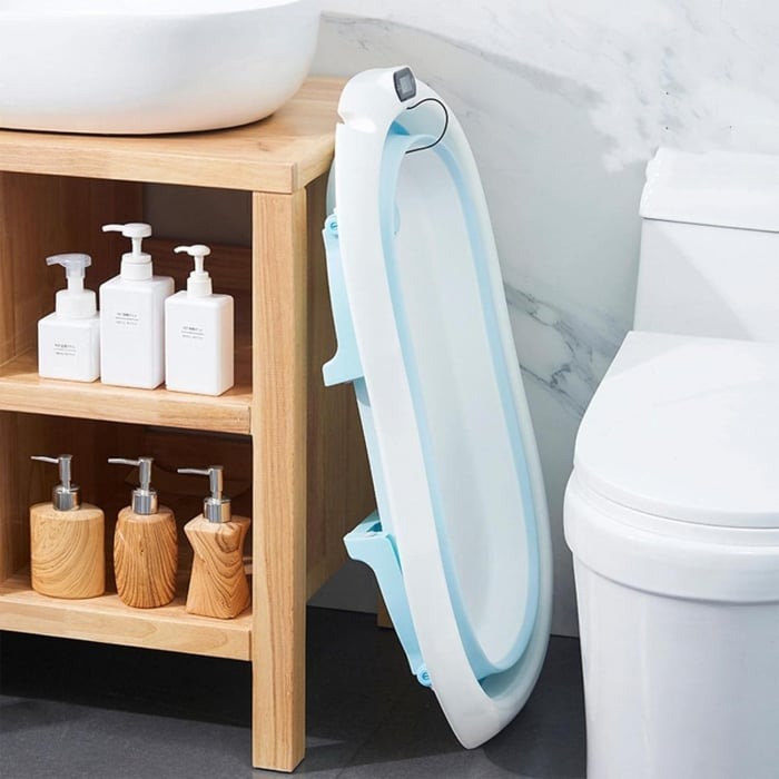 Cadita cu pernuta pentru bebelusi, termometru digital incorporat, pliabila, dop de scurgere, picioare anti-alunecare, design ergonomic, 75 x 45 x 22 cm, Roz/Albastru pastel